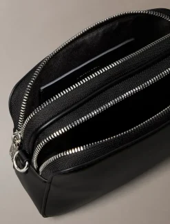 Calvin Klein Accessories naisten laukku Webbing Double Strap Camera Bag, musta