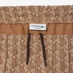 Lacoste miesten verryttelyhousut Parit Monogram Track Pant, beige
