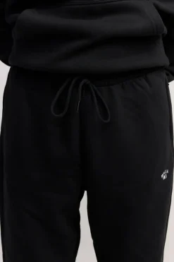 Makia miesten collegehousut Cove ZIP POCKET, musta